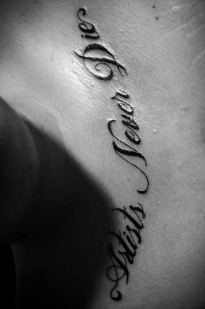 "Artist Never Die" chest piece tattoo