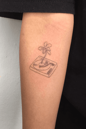 The flower on a turntable.      Ig : surfboy_tattoo_