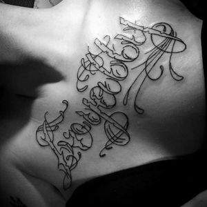 "Loyalty" chest piece tattoo