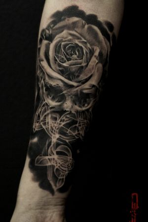 Tattoo by Pitbull tattoo