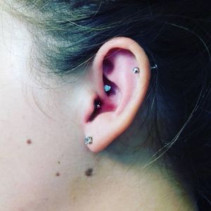 Daith piercing from cyberskin... Helix not done by me 