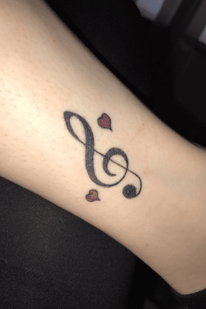 Love this tattoo!!                                                           #musictattoo #music #love #loveit #trebleclef #hearts #Black #red #blackandred #redandblack #musicnotes #tattooart #tattoos 