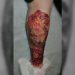 Realistic tattoo with wolf in flower flame. #realism #realistictattoo #wolf #wolfface #flame 