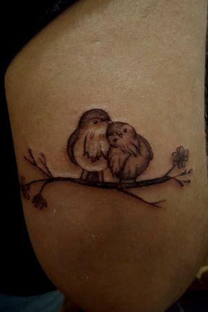 Small tattoo..a bird couple..