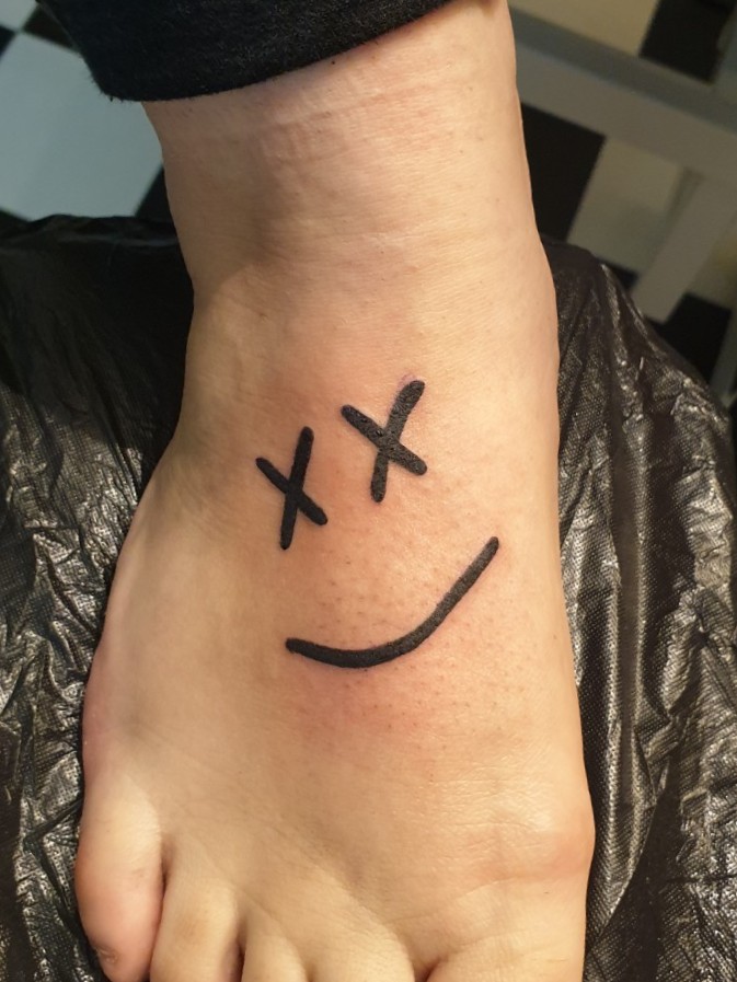 Cross Eyed Smiley Face Tattoo A Simple Guide to Get One and Make