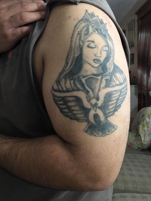 The Virgin Mary done in 2009. I want to do this tattoo again. It will come out 1 million times better. 