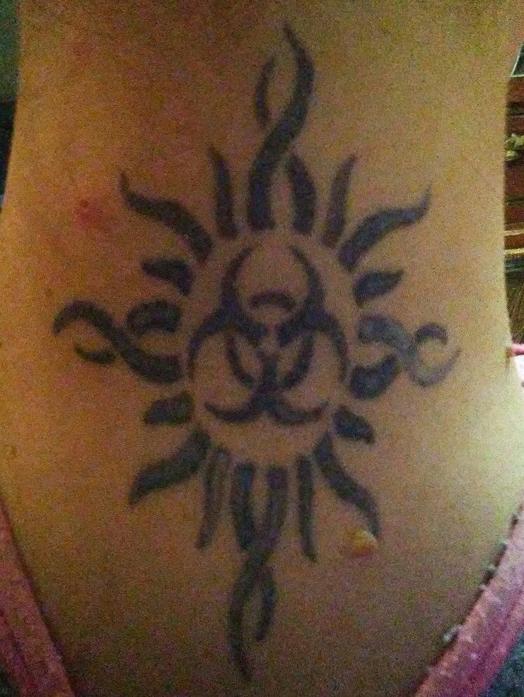 Godsmack logo Yes I love this band BUT the symbol of the sun would go great  with my moon o  Sun tattoos Moon tattoo designs Sun tattoo