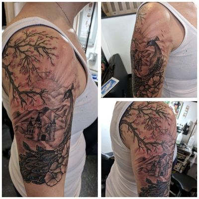 #peacock #peacocktattoo #halfsleeve #blackandgrey #castle #tree #tattoosforwomen 