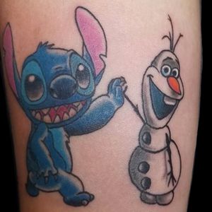 Stitch and Olaf on lower forearm