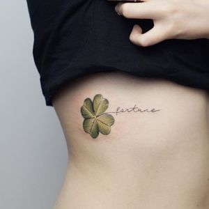Tattoo by Anna Botyk #AnnaBotyk #StPatricksDaytattoos #StPatricksDay #holidaytattoo #clover #fourleafedclover #green #plant #leaf #script
