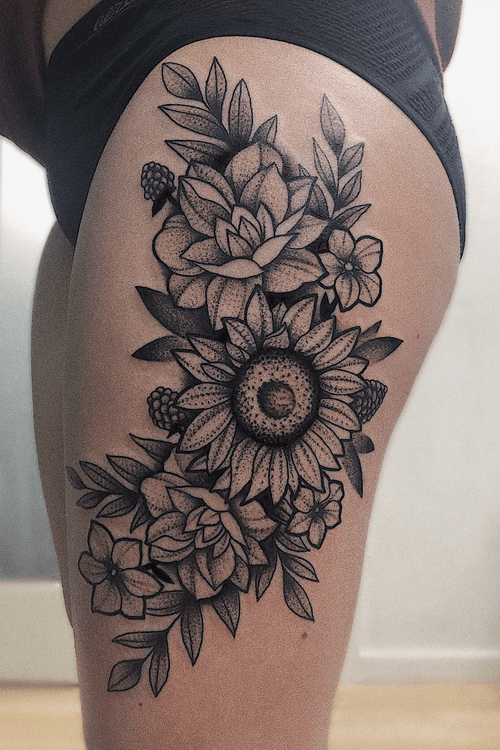 Black work floral thigh tattoo. Sunflower. Berries. Alexus Oropeza - IG @breadcrusts - Portland OR  #pdxtattoo #portland #pnw #vancouver #washington #blackwork #flower  #pretty #feminine #floral 