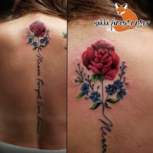 Some spinal flower action by Nikki Firestarter at The Tattooed Lady.nikkifirestarter.com#tattoo #bodyart #bodymod #ink #art #nonbinaryartist #nonbinarytattooist #mnartist #mntattoo #visualart #tattooart #tattoodesign #flowertattoo #floraltattoo #spinetattoo #backtattoo #roses #babysbreath #forgetmenots #bouquet #text #wordtattoo #quote #typography #font #wordart #flow