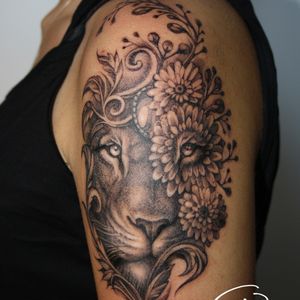 lion flowers tattoo