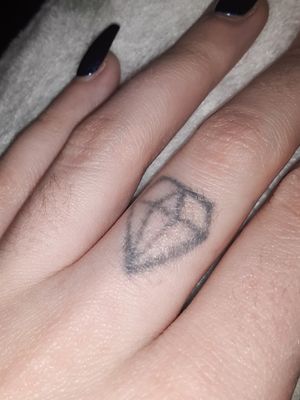 Diamond - homemade stick n' poke5 years old on left middle fingerDone by myself