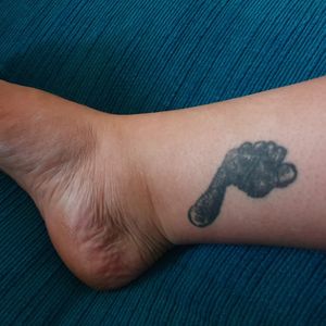 My second tattoo, my son's footprint when he was 6 weeks old. I would like to put a colorful design around it and perhaps add my daughter's footprint from the same age slightly above it. 