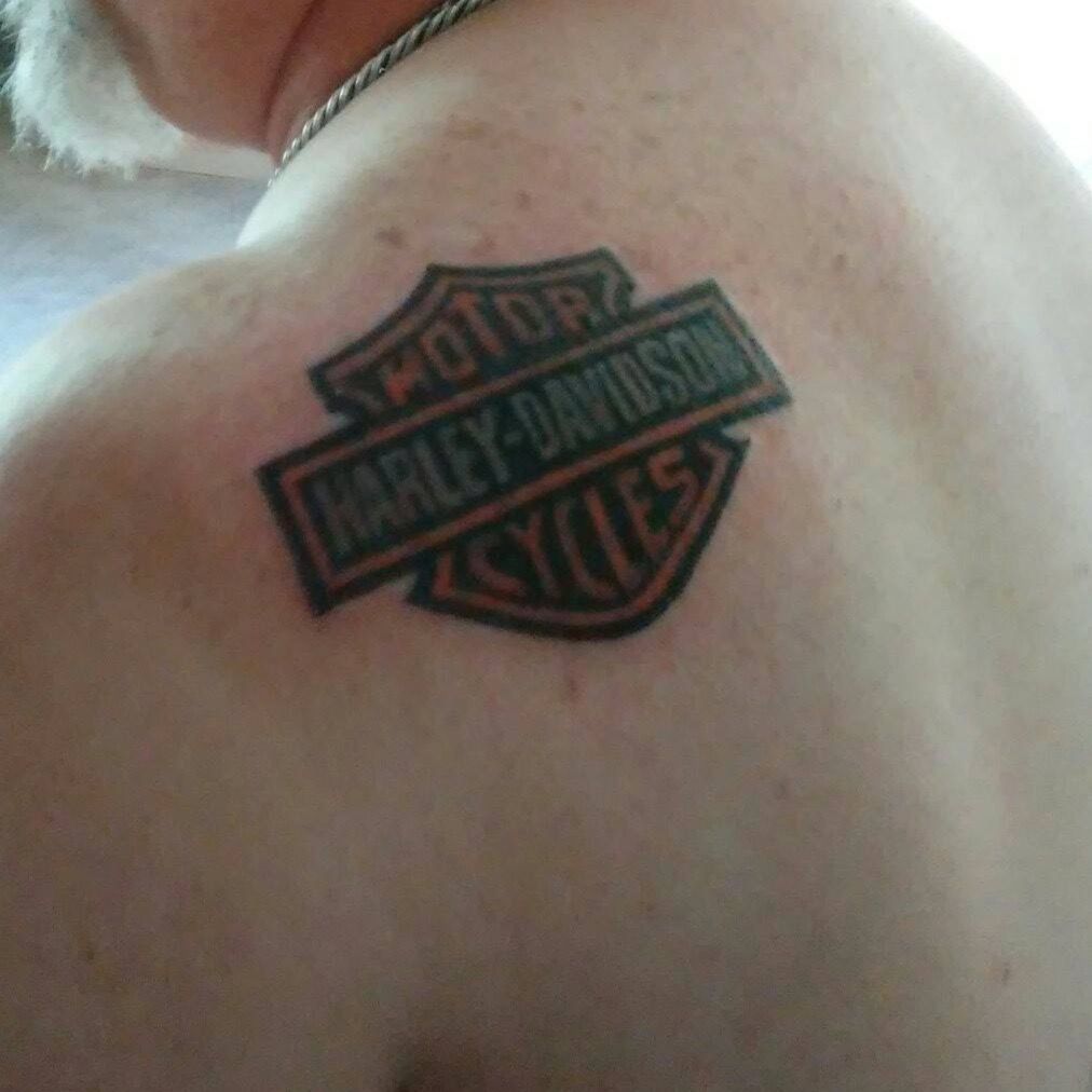 Why do people tattoo Harley Davidson logos on their bodies  Quora