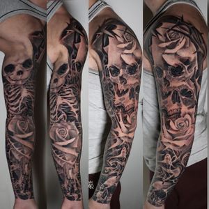 Black and grey full sleeve tattoo of Skulls and roses by Alo Loco London Best London tattoo artist