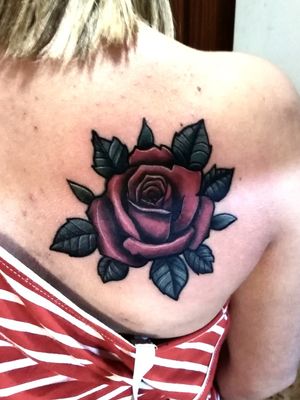 Colored rose tattoo