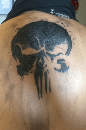 Punisher. Black skull on the upper back. Filled in black.    7X7.    Original fine art work on Instagram@an_geloop  #skull #punisher #black #tribal  
