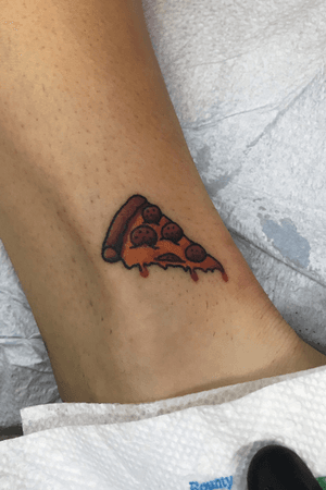 Tiny lil traditional pizza slice ankle tattoo 