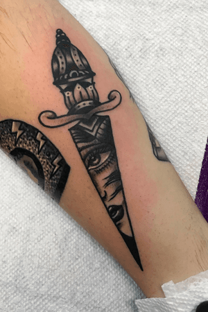 Black and grey traditional dagger with girlhead inside 