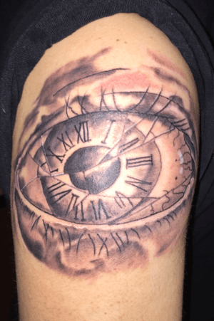 Eye with a broken clock face