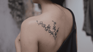 Cotton flower tattoo - botanical - back tattoo