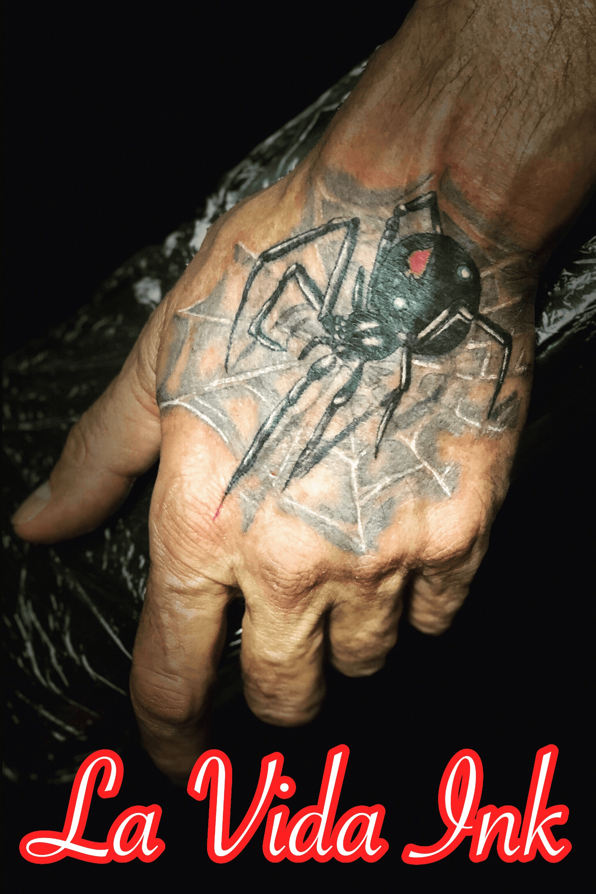 A real creeper  Black widow hand tattoo by our resident artist  Liam Attention to detailing is truly life like     For  booking information  By Vividink Moseley  Facebook