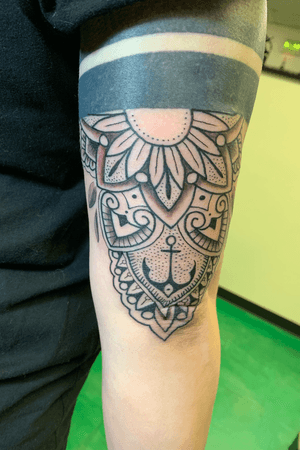 Tattoo by Metropolis Tattoo & Piercing