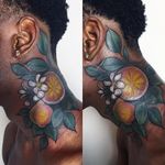 Tattoo by Miryam Lumpini #MiryamLumpini #TannParker #InktheDiaspora #citrus #color #flowers #floral #leaves #orange #necktattoo #qpocttt #poctattoo #qpoctattoo #brownskin #blackskin #empower #visibility #tattoocommunity