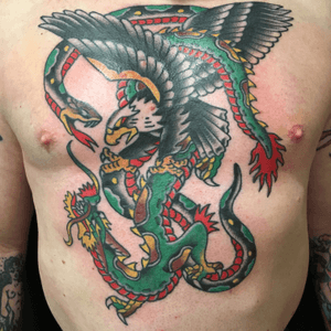 Traditional tattoo on Mr D by Carl Hallowell... #traditional #traditionaltattoo #Realtraditionaltattoo #TraditionalArtist #CarlHallowell #texas #dallastattooartist #eagle #dragon #snake #chesttattoo #chestpiece 