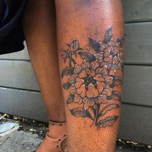 Tattoo by Sema Tattoo #SemaTattoo #TannParker #InktheDiaspora #flowers #floral #qpocttt #poctattoo #qpoctattoo #brownskin #blackskin #empower #visibility #tattoocommunity