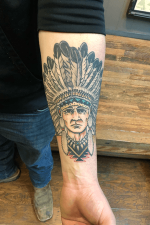 Cheif head to cover up severly scarred tattoo.