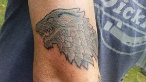 stark wolf Game of thrones arm tattoo