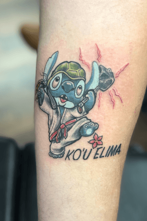 Client asked for Stitch wearing a gui holding thors hammer, lady bug shield and wearing a turtle helmt to represent his five kids. Tough request but fun tattoo. 