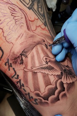 Beautiful doves in progress by artist Elias Mora at Arte Tattoo Studios located in Gainesville Georgia! 