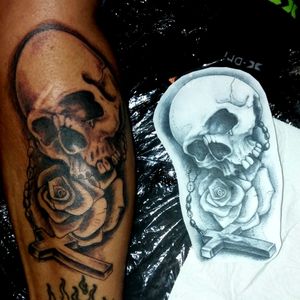 Black and grey Skull and rose tattoo