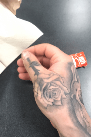 Thumb rose tattoo done by max falada 