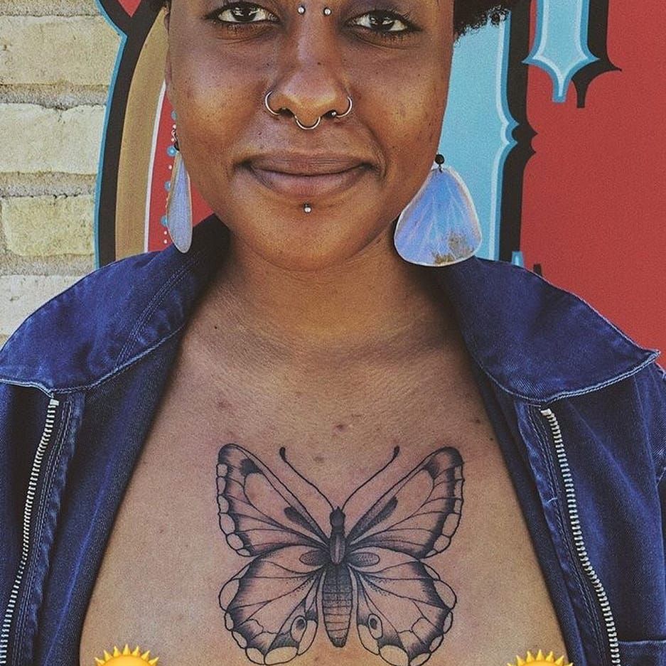 Butterfly Tattoo on Black Skin Chest