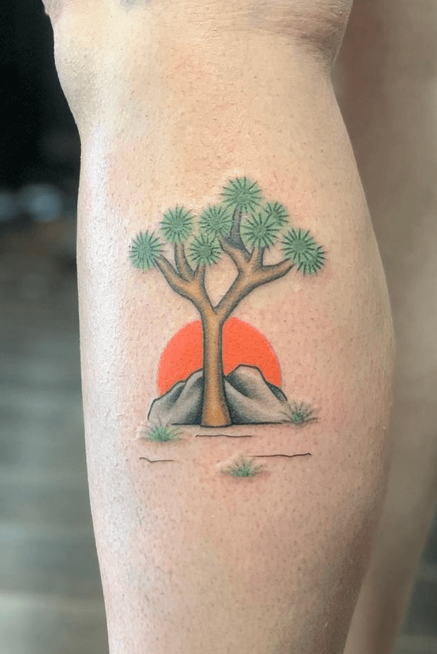 Joshua tree tattoo by Julie Bolene  Globe tattoos Traditional tattoo  Feather tattoo