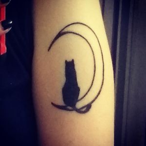 My first tattoo ♥️ it is a cat on a moon. It is not finished yet. Next session I want to get a galaxy background for it. I will post when it is finished. 