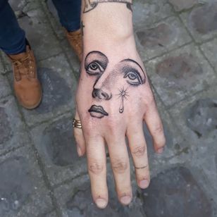 Tattoo by Ana and Camille #AnaandCamille #blackandgrey #illustrative #renaissance #handtattoo #tear #portrait #lady