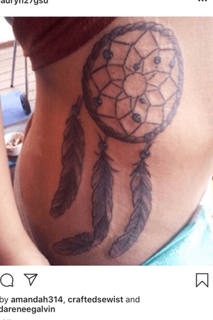 Dream catcher ... in my mind the i wanted it to be more realistic especially the feathers i like the placement ... got after finishing my masters in special ed ... chased that dream from a hospital bead 