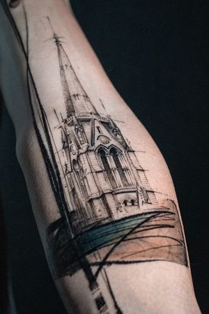 Experience intricate blackwork design of a church pattern on your forearm by La Bottega dell'Arte. Enjoy the fusion of fine line and illustrative styles.