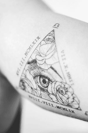 Eye rose tattoo 
