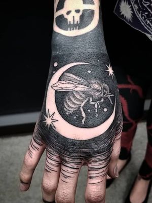 Tattoo by Thomas E #ThomasE #moontattoos #Moontattoo #moon #night #nightsky #nature #sky #blackwork #star #bee #handtattoo