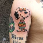 Tattoo by Paul Colli #PaulColli #traditional #snoopy #tiedye #color #oldschool #funny #cute #peanuts #charliebrown