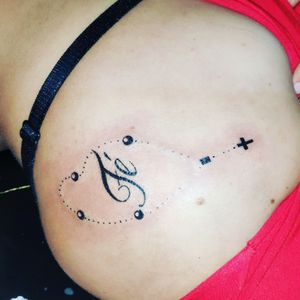 Tatuagem fé com tercinho nas costas femininas Andrade Ink TattooWhats: 4298575342