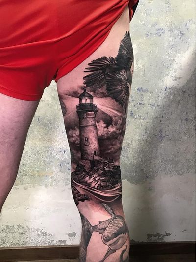 Tattoo by Andrew Borisyuk #AndrewBorisyuk #landscapetattoos #landscape #world #land #world #earth #environment #realism #realistic #lighthouse #mountain #shark #clouds #blackandgrey