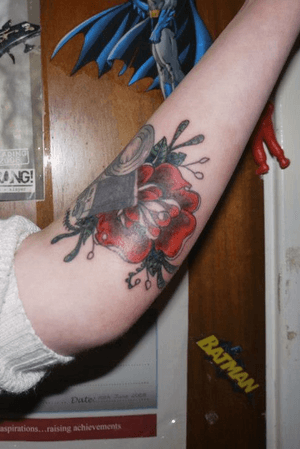The second half of my tattoo was two additional red roses on either side which were also tattooed by TattooStu (Stuart Rowles.)